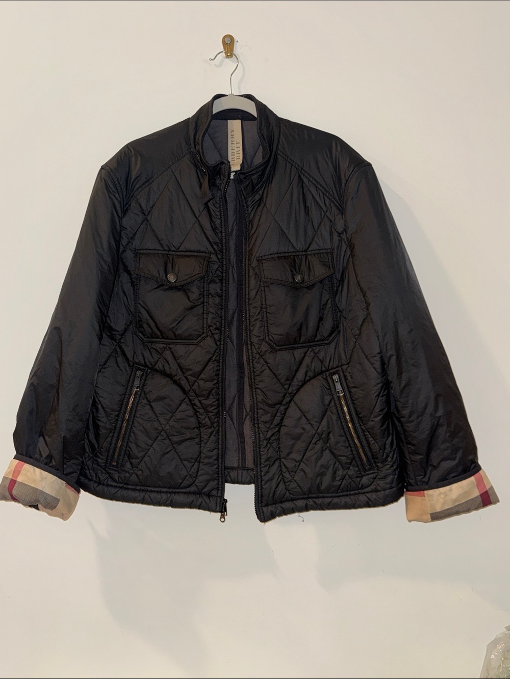Burberry Black Quilted Utility Jacket with Check Cuff Detail